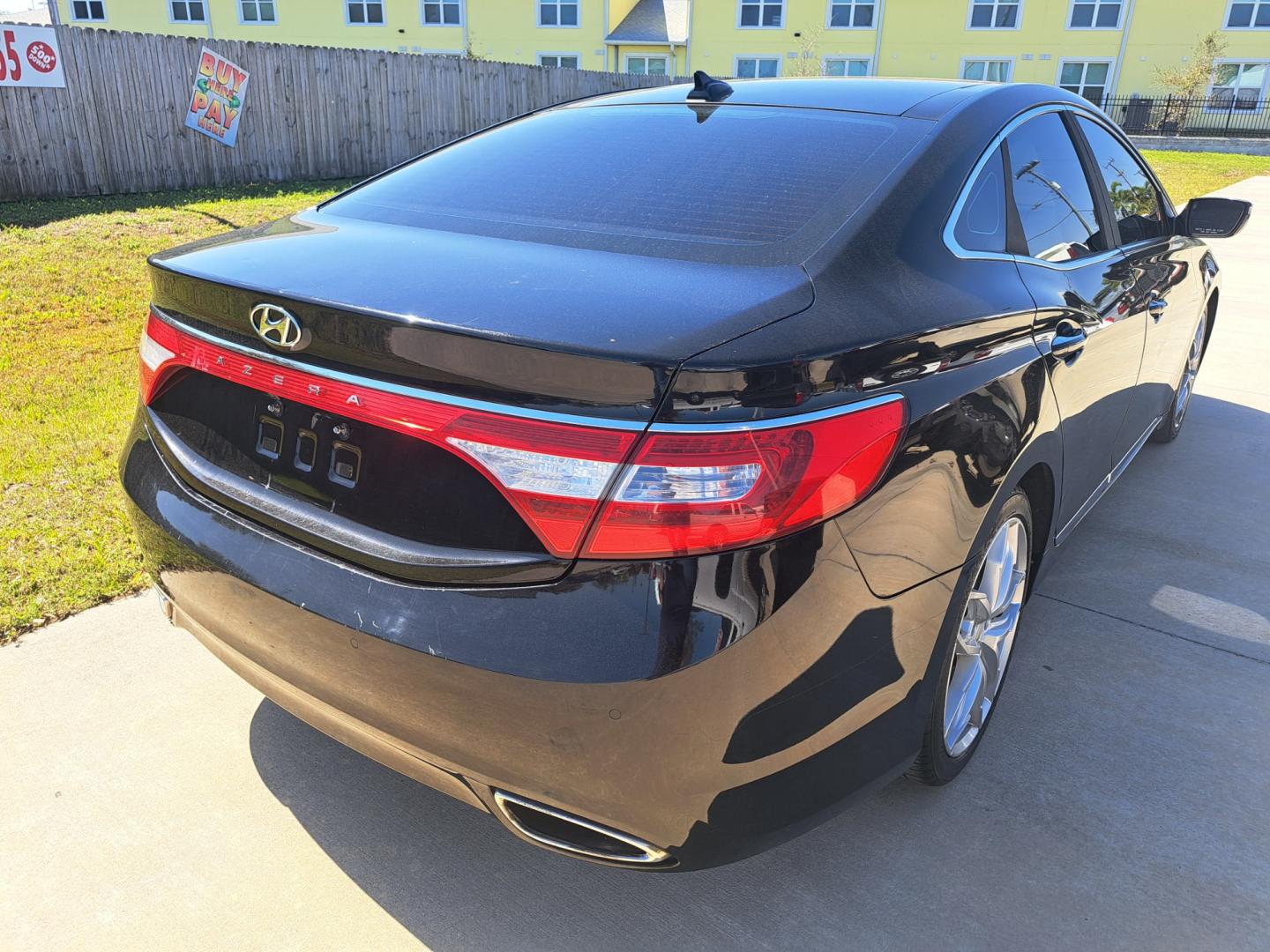 2013 Black Hyundai Azera 3.3L (KMHFH4JG0DA) with an 3.3L V6 DOHC 24V engine, 6-Speed Automatic transmission, located at 1181 Aurora Rd, Melbourne, FL, 32935, (321) 241-1100, 28.132914, -80.639175 - Photo#2